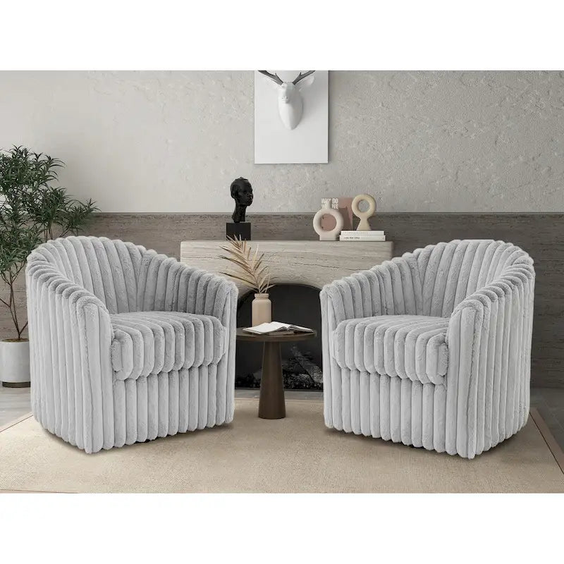 Fauteuil tonneau pivotant capitonné à fines rayures