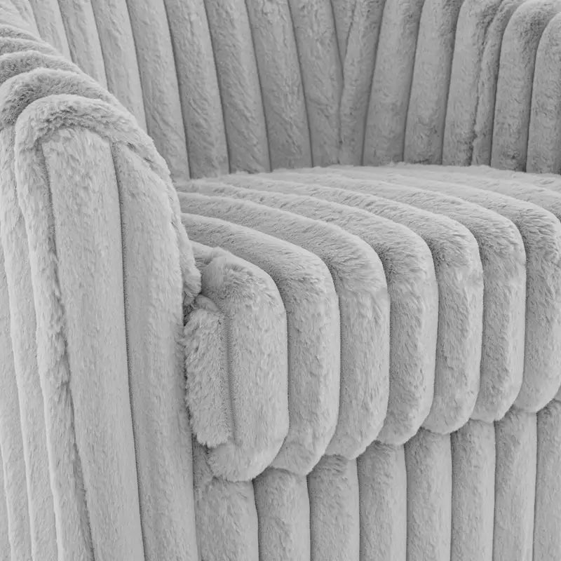 Fauteuil tonneau pivotant capitonné à fines rayures